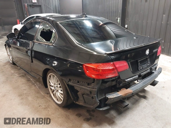 2011 BMW 3 Series 335is with VIN WBAKG1C51BE618450, listed as a IAAI auction lot 41555179 with 100,942 mi miles and . Bid and sale history available at carsss.com. Image 3.