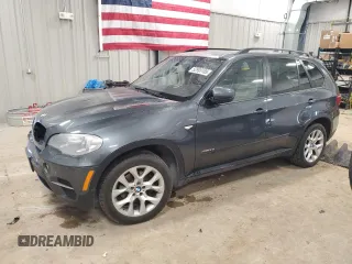 2012 BMW X5 35i z VIN 5UXZV4C55CL750678, wystawiony jako Copart lot #52995185 z przebiegiem 130 912 mil mil oraz Czysty tytuł • Clean title. Historia ofert i sprzedaży dostępna na DreamBid. Obrazek 1.
