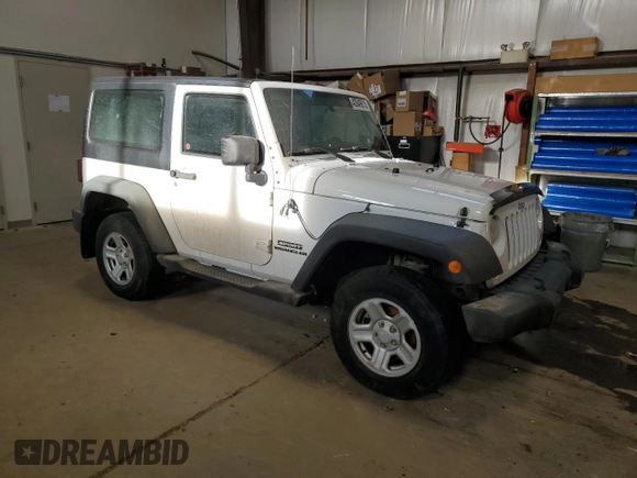2011 Jeep Wrangler Sport with VIN 1J4AA2D12BL555530, listed as a Copart auction lot 42049915 with 83,349 mi miles and Salvage Title. Bid and sale history available at carsss.com. Image 4.