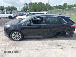 2020 Ford Edge Titanium with VIN 2FMPK4K93LBA05221, listed as a IAAI auction lot 42497787 with Not provided miles and . Bid and sale history available at DreamBid. Image 13.