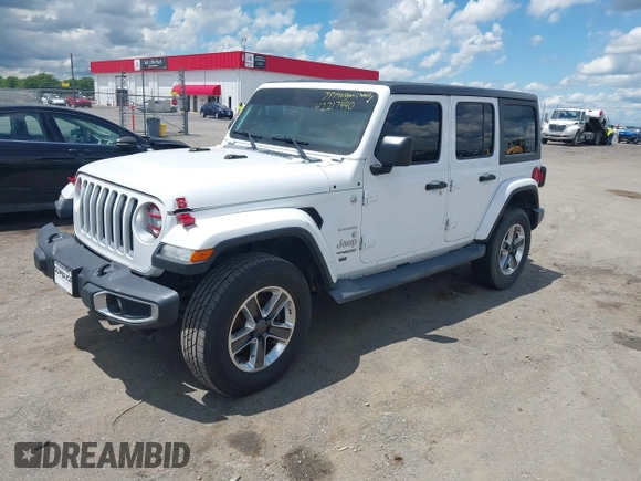 2019 Jeep Wrangler Unlimited Sahara with VIN 1C4HJXEN7KW535887, listed as a IAAI auction lot 42217440 with 91,226 mi miles and . Bid and sale history available at DreamBid. Image 2.