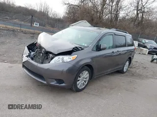 2014 Toyota Sienna LE with VIN 5TDJK3DC1ES087626, listed as a IAAI auction lot 41610813 with 142,311 mi miles and . Bid and sale history available at DreamBid. Image 17.