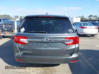 2020 Honda Odyssey Touring z VIN 5FNRL6H8XLB035047, wystawiony jako IAAI lot #41794343 z przebiegiem 57 537 mil mil oraz . Historia ofert i sprzedaży dostępna na DreamBid. Obrazek 16.