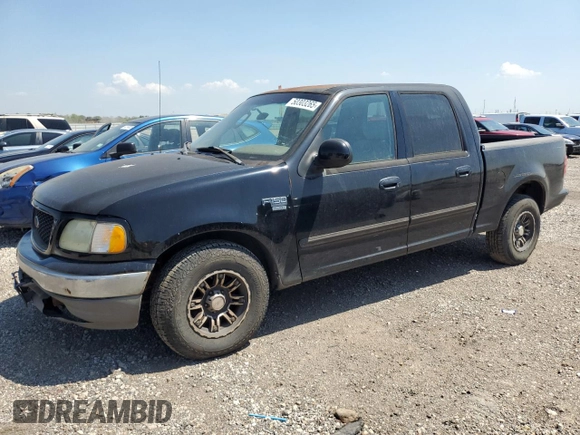 2003 Ford F-150 XLT with VIN 1FTRW07623KD82847, listed as a Copart auction lot 50303265 with 156,781 mi miles and Clean Title. Bid and sale history available at carsss.com. Image 1.