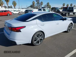 2025 Nissan Altima SR with VIN 1N4BL4CV6SN322491, listed as a IAAI auction lot 41549681 with 4,119 mi miles and . Bid and sale history available at DreamBid. Image 4.