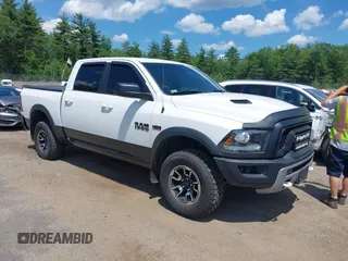 2016 Ram 1500 Rebel with VIN 1C6RR7YT0GS371783, listed as a IAAI auction lot 42571663 with 129,422 mi miles and . Bid and sale history available at DreamBid. Image 1.