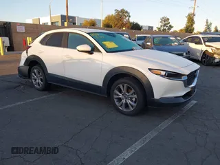 2021 Mazda CX-30 Select z VIN 3MVDMABLXMM271572, wystawiony jako IAAI lot #41685537 z przebiegiem 22 726 mil mil oraz . Historia ofert i sprzedaży dostępna na DreamBid. Obrazek 1.