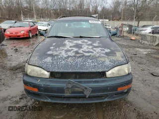1994 Toyota Camry z VIN 4T1SK12W5RU365849, wystawiony jako Copart lot #44363565 z przebiegiem 226 124 mil mil oraz Szkoda całkowita • Salvage title. Historia ofert i sprzedaży dostępna na DreamBid. Obrazek 5.