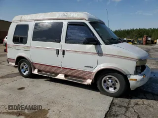 1999 Chevrolet Astro Cargo Van YF7 with VIN 1GBDM19WXXB133774, listed as a Copart auction lot 50024015 with 240,716 mi miles and Salvage Title. Bid and sale history available at carsss.com. Image 4.