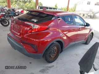 2018 Toyota C-HR XLE with VIN NMTKHMBX0JR058660, listed as a IAAI auction lot 41929790 with 136,358 mi miles. Bid and sale history available at carsss.com. Image 4.