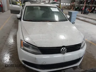 2011 Volkswagen Jetta SE z VIN 3VWDX7AJ9BM003697, wystawiony jako IAAI lot #42305601 z przebiegiem 145 715 mil mil oraz . Historia ofert i sprzedaży dostępna na DreamBid. Obrazek 6.