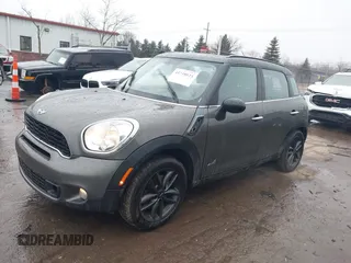 2014 MINI Countryman S z VIN WMWZC5C55EWP38431, wystawiony jako IAAI lot #41710523 z przebiegiem 153 441 mil mil oraz . Historia ofert i sprzedaży dostępna na DreamBid. Obrazek 2.