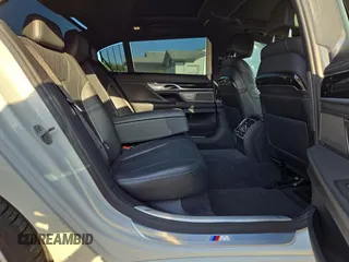 2017 BMW 7 Series 740i with VIN WBA7E2C54HG740427, listed as a Copart auction lot 54992345 with 93,252 mi miles and Clean Title. Bid and sale history available at carsss.com. Image 6.