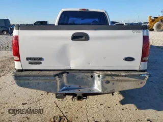 1999 Ford F-350 XL with VIN 1FTSW30F4XEB76477, listed as a Copart auction lot 56373415 with 240,170 mi miles and Salvage title. Bid and sale history available at DreamBid. Image 6.