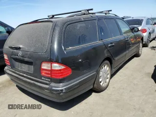 2001 Mercedes-Benz E-Class AWD with VIN WDBJH82J71X051634, listed as a Copart auction lot 51299544 with 286,211 mi miles and Salvage Title. Bid and sale history available at carsss.com. Image 3.