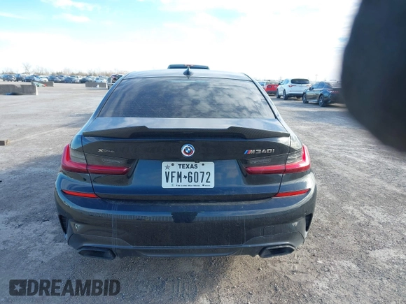 2022 BMW 3 Series M340i xDrive with VIN WBA5U9C08NFM68599, listed as a IAAI auction lot 41260340 with Not Provided miles and . Bid and sale history available at DreamBid. Image 16.