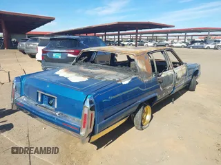 1992 Cadillac Brougham z VIN 1G6DW5472NR710091, wystawiony jako IAAI lot #41657138 z przebiegiem Nie podano mil oraz . Historia ofert i sprzedaży dostępna na DreamBid. Obrazek 4.