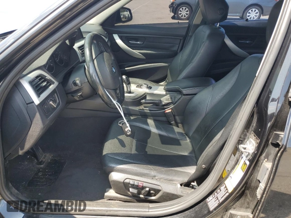 2013 BMW 3 Series 328i xDrive with VIN WBA3B5G56DNS05446, listed as a Copart auction lot 61979475 with 102,674 mi miles and Salvage title. Bid and sale history available at DreamBid. Image 7.