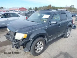 2008 Ford Escape Limited with VIN 1FMCU94108KA71185, listed as a IAAI auction lot 41737102 with 224,666 mi miles. Bid and sale history available at carsss.com. Image 2.