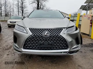 2022 Lexus RX with VIN 2T2HZMDA4NC321485, listed as a Copart auction lot 70409922 with 8,963 mi miles. Bid and sale history available at carsss.com. Image 5.