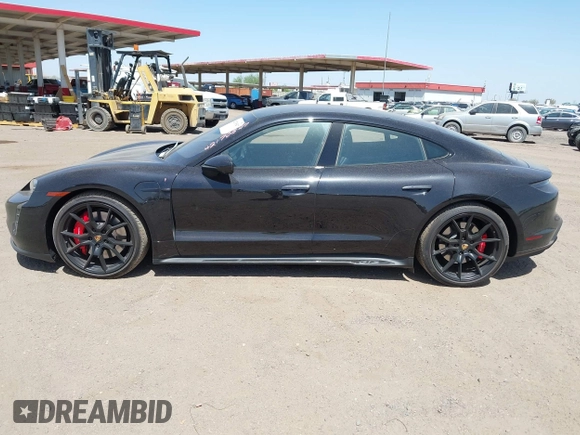 2022 Porsche Taycan GTS z VIN WP0AD2Y12NSA59275, wystawiony jako IAAI lot #42170547 z przebiegiem 43 757 mil mil oraz . Historia ofert i sprzedaży dostępna na DreamBid. Obrazek 14.