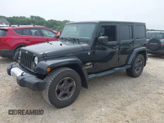 2014 Jeep Wrangler Unlimited Sahara with VIN 1C4HJWEG8EL292835, listed as a IAAI auction lot 42705672 with 176,769 mi miles and . Bid and sale history available at DreamBid. Image 18.