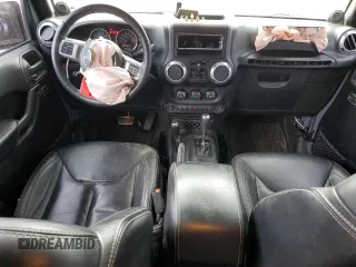 2014 Jeep Wrangler Unlimited Rubicon z VIN 1C4HJWFG0EL316513, wystawiony jako Copart lot #57182325 z przebiegiem 150 012 mil mil oraz Szkoda całkowita • Salvage title. Historia ofert i sprzedaży dostępna na DreamBid. Obrazek 8.