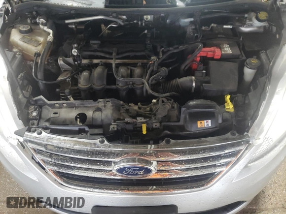 2013 Ford Fiesta SE z VIN 3FADP4BJ8DM220456, wystawiony jako Copart lot #58596825 z przebiegiem 115 933 mil mil oraz Szkoda całkowita • Salvage title. Historia ofert i sprzedaży dostępna na DreamBid. Obrazek 11.