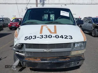 2000 Chevrolet Astro Cargo with VIN 1GCDM19W1YB217561, listed as a IAAI auction lot 41805659 with Not Provided miles. Bid and sale history available at carsss.com. Image 12.