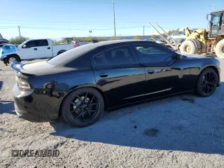 2015 Dodge Charger SXT with VIN 2C3CDXHG8FH769883, listed as a Copart auction lot 87723825 with 81,859 mi miles and Salvage Title. Bid and sale history available at DreamBid. Image 3.