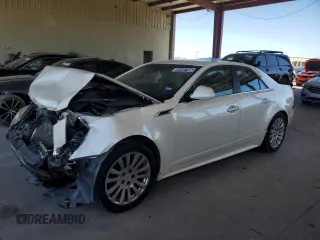 2012 Cadillac CTS Premium z VIN 1G6DP5E35C0147807, wystawiony jako Copart lot #46492785 z przebiegiem 111 145 mil mil oraz Czysty tytuł • Clean title. Historia ofert i sprzedaży dostępna na DreamBid. Obrazek 1.