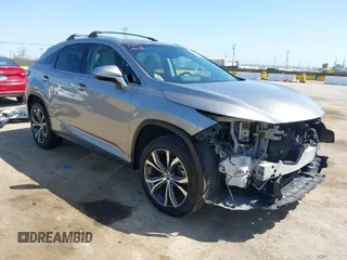 2019 Lexus RX with VIN 2T2BGMCA4KC042885, listed as a IAAI auction lot 41975309 with 58,089 mi miles. Bid and sale history available at carsss.com. Image 1.
