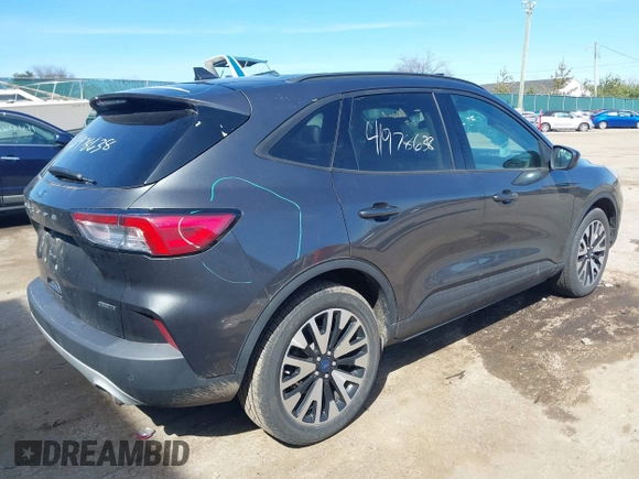 2020 Ford Escape SE Sport Hybrid with VIN 1FMCU9BZ0LUB81689, listed as a IAAI auction lot 41978638 with 69,831 mi miles and . Bid and sale history available at DreamBid. Image 4.