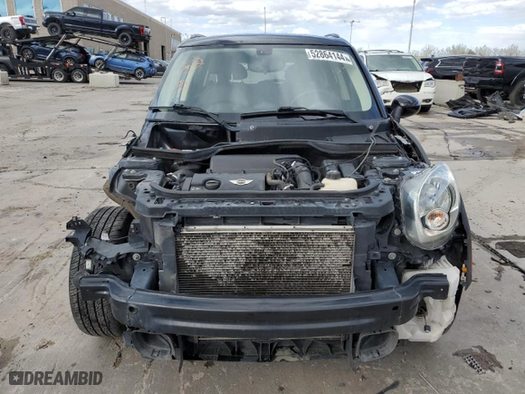 2016 MINI Cooper Countryman S with VIN WMWZC5C50GWU03080, listed as a Copart auction lot 52864144 with 70,949 mi miles and Salvage Title. Bid and sale history available at carsss.com. Image 5.