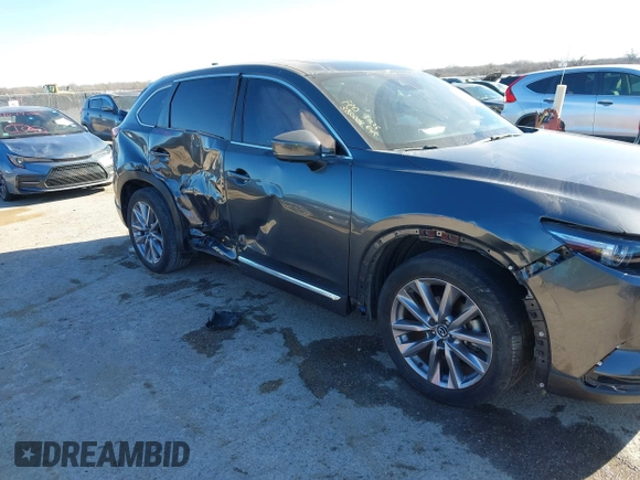2023 Mazda CX-9 Carbon Edition z VIN JM3TCBDY2P0633889, wystawiony jako IAAI lot #41804791 z przebiegiem 20 454 mil mil oraz . Historia ofert i sprzedaży dostępna na DreamBid. Obrazek 6.