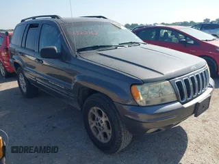 2002 Jeep Grand Cherokee Limited z VIN 1J4GX58N52C282347, wystawiony jako IAAI lot #42322762 z przebiegiem 153 844 mil mil oraz . Historia ofert i sprzedaży dostępna na DreamBid. Obrazek 1.