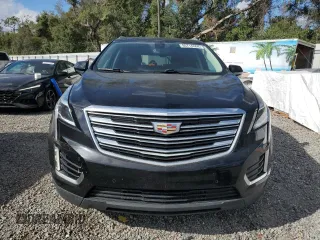 2017 Cadillac XT5 Premium Luxury FWD z VIN 1GYKNCRS7HZ130553, wystawiony jako Copart lot #60337905 z przebiegiem Nie podano mil oraz Szkoda całkowita • Salvage title. Historia ofert i sprzedaży dostępna na DreamBid. Obrazek 5.