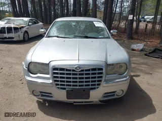 2007 Chrysler 300 C with VIN 2C3KA63H17H896796, listed as a IAAI auction lot 41929716 with 166,803 mi miles. Bid and sale history available at carsss.com. Image 12.