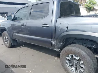 2023 Toyota Tacoma SR with VIN 3TMCZ5AN0PM635933, listed as a IAAI auction lot 42543126 with 32,960 mi miles and . Bid and sale history available at DreamBid. Image 15.