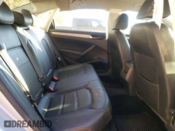 2013 Volkswagen Passat Wolfsburg Edition z VIN 1VWAP7A30DC133893, wystawiony jako Copart lot #82477184 z przebiegiem 136 344 mil mil oraz Szkoda całkowita • Salvage title. Historia ofert i sprzedaży dostępna na DreamBid. Obrazek 10.
