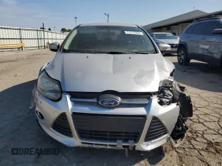 2013 Ford Focus SE z VIN 1FADP3F21DL351940, wystawiony jako Copart lot #55051225 z przebiegiem 103 994 mil mil oraz Tytuł czysty. Historia ofert i sprzedaży dostępna na DreamBid. Obrazek 5.