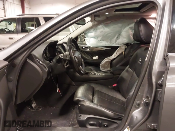 2014 Infiniti Q50 Premium with VIN JN1BV7ARXEM699902, listed as a IAAI auction lot 42135410 with 103,929 mi miles and . Bid and sale history available at DreamBid. Image 5.