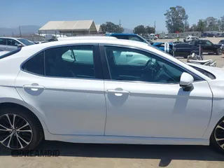 2018 Toyota Camry LE with VIN 4T1B11HK5JU007856, listed as a IAAI auction lot 42531732 with 121,020 mi miles and . Bid and sale history available at DreamBid. Image 14.