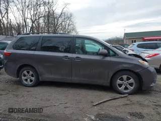 2015 Toyota Sienna LE AAS with VIN 5TDKK3DC6FS528608, listed as a IAAI auction lot 41492955 with 137,853 mi miles and . Bid and sale history available at DreamBid. Image 14.