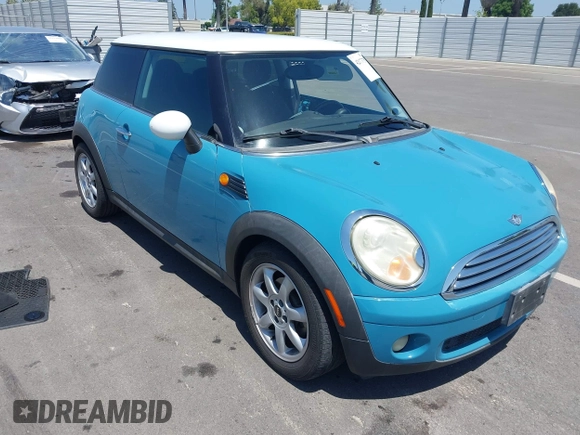 2007 MINI Hardtop with VIN WMWMF335X7TT54929, listed as a IAAI auction lot 42173757 with 71,496 mi miles and . Bid and sale history available at DreamBid. Image 1.