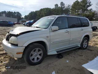 2002 Suzuki XL7 Standard z VIN JS3TX92V324118918, wystawiony jako Copart lot #83589184 z przebiegiem 203 827 mil mil oraz Szkoda całkowita • Salvage title. Historia ofert i sprzedaży dostępna na DreamBid. Obrazek 1.