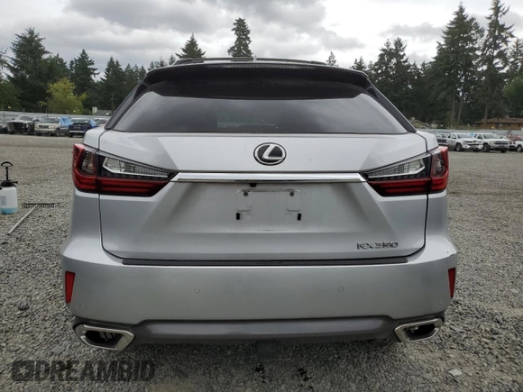 2016 Lexus RX 350 with VIN JTJBZMCA5G2005796, listed as a Copart auction lot 64453905 with 69,784 mi miles and Salvage title. Bid and sale history available at DreamBid. Image 6.