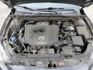 2016 Mazda 3 i Touring z VIN JM1BM1V7XG1311352, wystawiony jako Copart lot #56194805 z przebiegiem 115 321 mil mil oraz Szkoda całkowita • Salvage title. Historia ofert i sprzedaży dostępna na DreamBid. Obrazek 11.