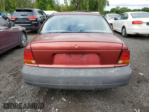 1997 Saturn SL z VIN 1G8ZH5285VZ188074, wystawiony jako Copart lot #51501005 z przebiegiem 125 973 mil mil oraz Nie do naprawy • Non repairable. Historia ofert i sprzedaży dostępna na DreamBid. Obrazek 6.