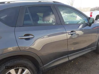 2016 Mazda CX-5 Touring with VIN JM3KE4CY9G0915305, listed as a IAAI auction lot 41840519 with 188,702 mi miles and . Bid and sale history available at carsss.com. Image 13.